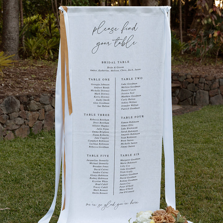 Fabric wedding sign as a seating chart printed on linen material. Peach Perfect Australia.