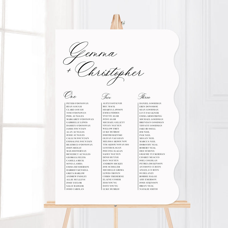 Wedding seating chart with traditional formal calligraphy style designed and printed in Australia on acrylic or foamboard. Wavy shape.
