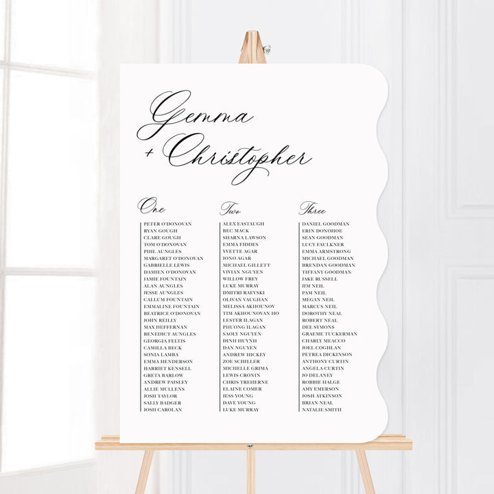 Wedding seating chart with traditional formal calligraphy style designed and printed in Australia on acrylic or foamboard. Wavy shape.
