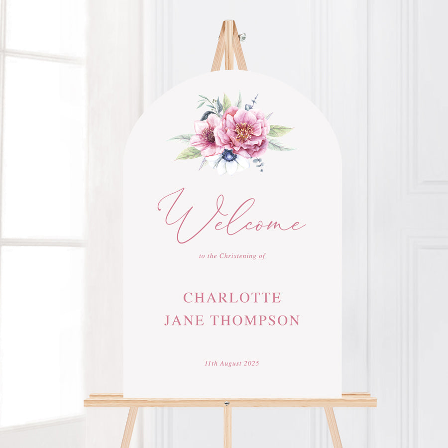 Arch shape baptism or christening welcome sign board with pink flowers and calligraphy font.