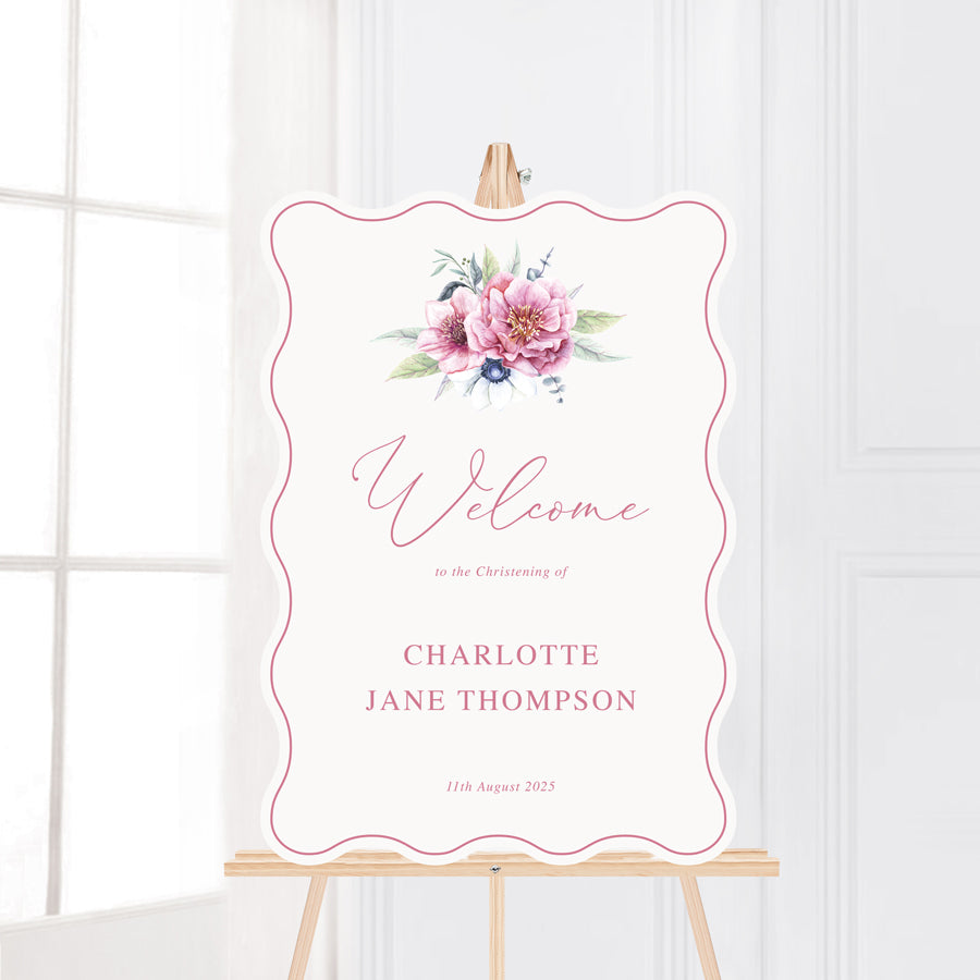 Wavy shape baptism or christening welcome sign board with pink flowers and calligraphy font.