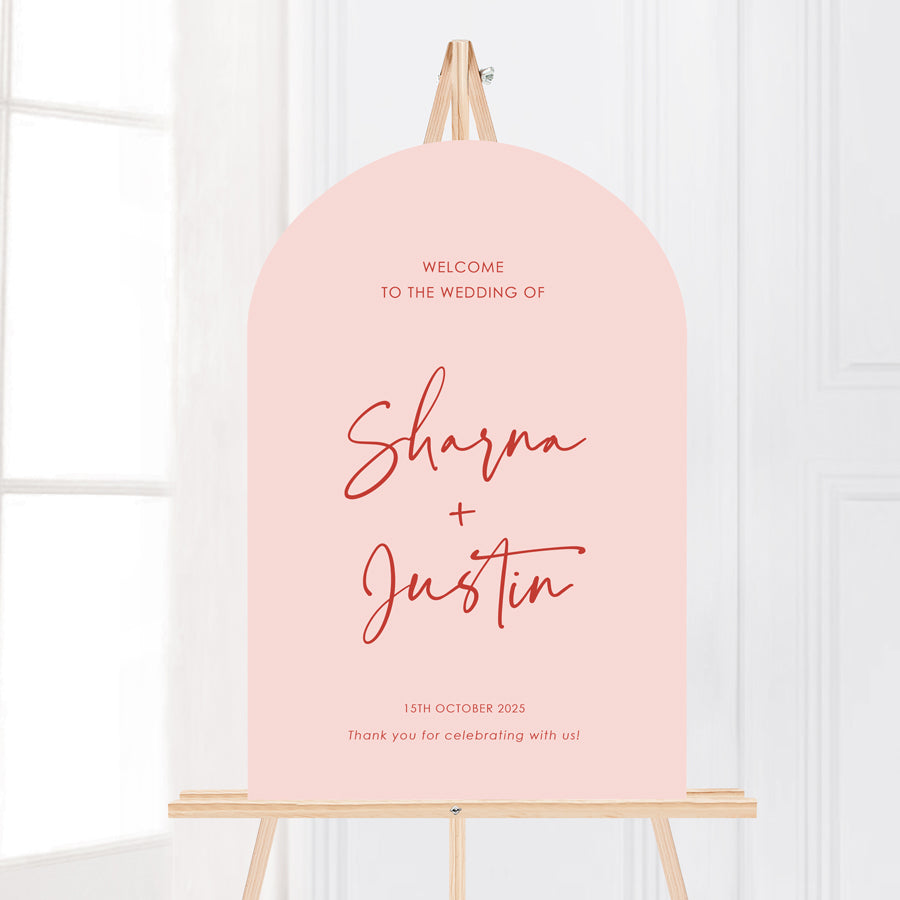 Arch shape wedding welcome sign with modern font in pale pink and red, printed on foamboard or acrylic. Peach Perfect Australia. 