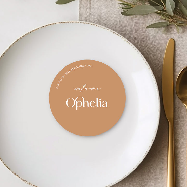 Round or circle shape wedding place cards with modern font style in neutral cinnamon and white. Peach Perfect Australia. Escort or name cards.