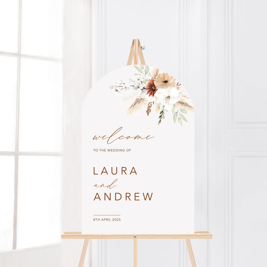 Modern wedding welcome sign board with boho florals, rust colours and calligraphy. Acrylic or PVC. Arch shape, printed in Australia.