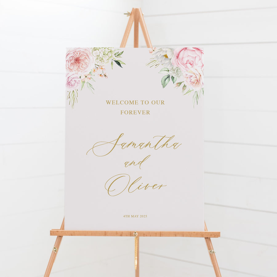Pink and gold floral wedding welcome sign with roses and green leaves. Designed and printed in Australia