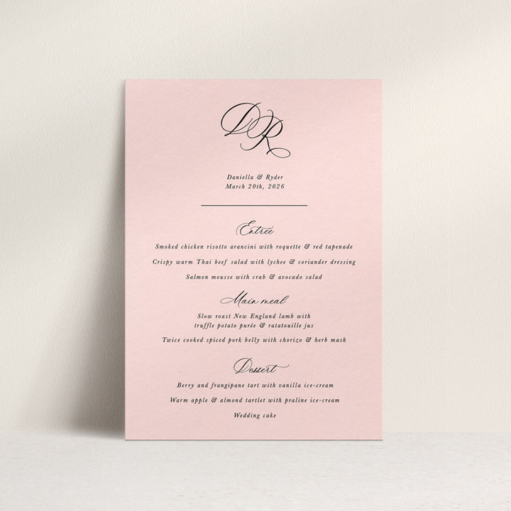 Elegant formal wedding menu on dinner plate with monogram in calligraphy. Soft pink cardstock. Designed in Australia.