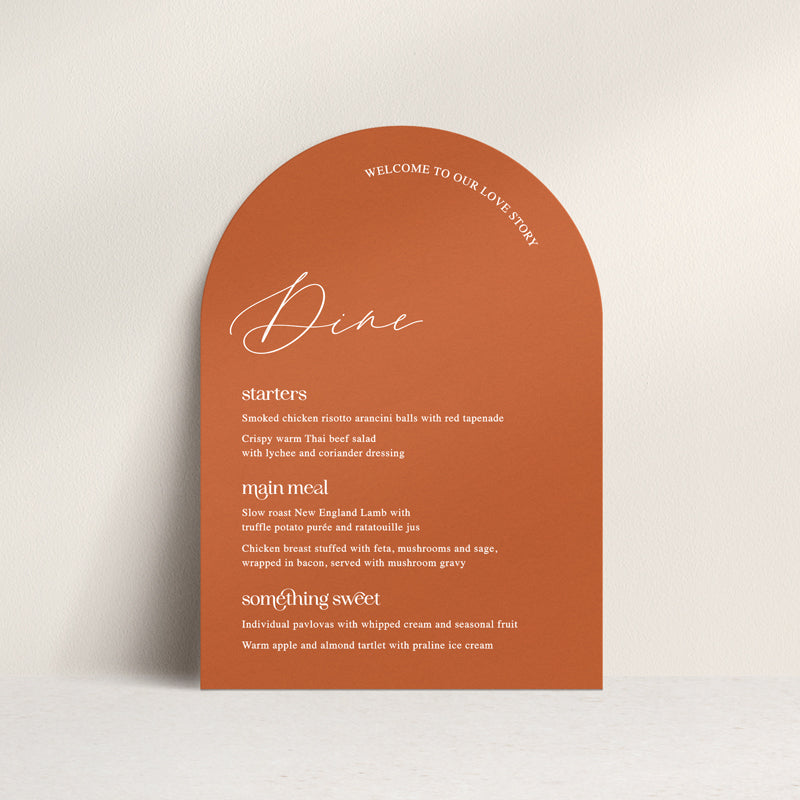 Professionally designed and printed wedding menu in arch shape Australia. Burnt orange and white bold colours.