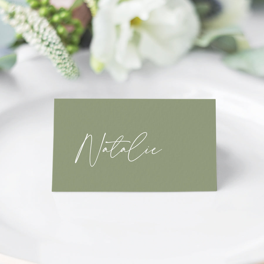 Folded wedding or event place card, white ink on green with calligraphy font. Peach Perfect Australia.