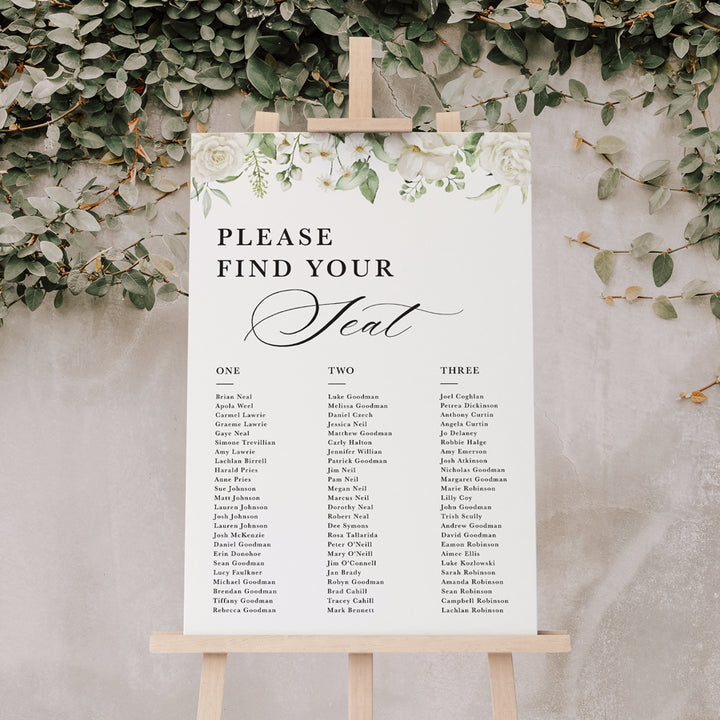 Wedding seating chart with white florals and calligraphy, designed and printed in Australia on PVC board or acrylic.