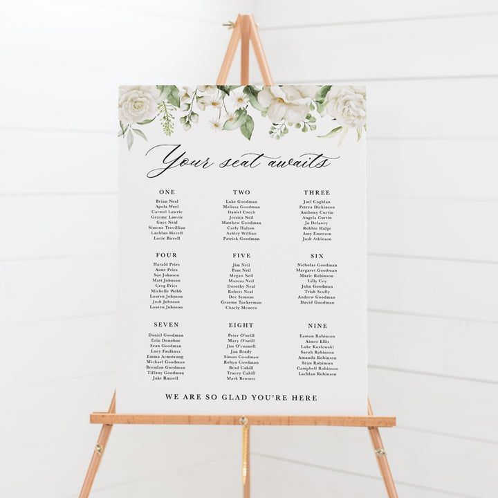 Wedding seating chart with white florals and calligraphy, designed and printed in Australia on PVC board or acrylic.