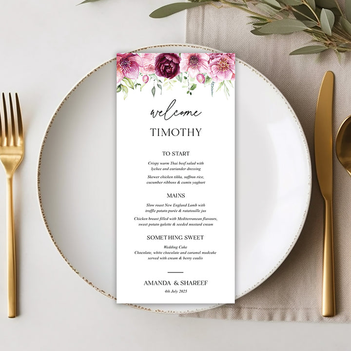 Pink floral wedding or baptism menu on white cardstock with greenery and individual guest names printed. Designed and printed in Australia.